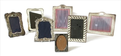 Lot 70 - A collection of silver and white metal photograph frames