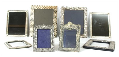 Lot 81 - A collection of silver and white metal photograph frames