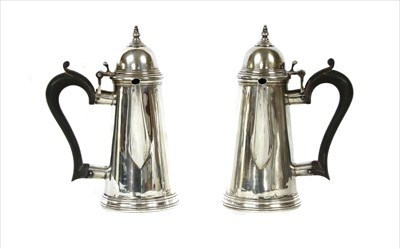 Lot 118 - A pair of silver Georgian style chocolate pots