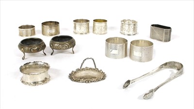 Lot 76 - A collection of silver items to include napkin rings