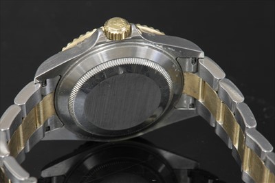 Lot 388 - A gentlemen's bi-colour Rolex 'Oyster Perpetual Submariner' automatic bracelet watch, c.2004
