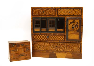 Lot 348 - An early 20th century Japanese parquetry table cabinet