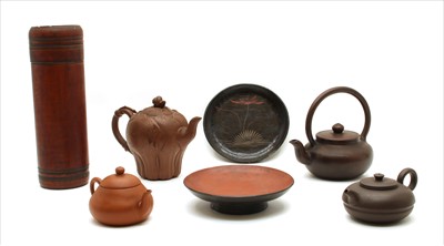 Lot 298 - A collection of Oriental redware teapots