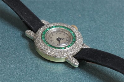 Lot 112 - A ladies' Art Deco 18ct two colour gold Longines emerald and diamond cocktail watch, c.1920