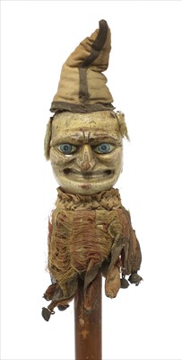 Lot 62 - A carved and polychrome decorated Mr Punch rattle