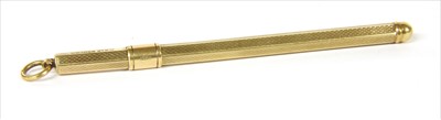 Lot 42 - A 9ct gold cocktail swizzle stick