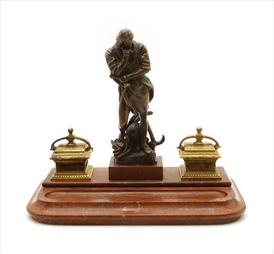 Lot 323 - A Victorian bronze and marble figural ink stand