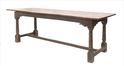 Lot 623 - An oak and elm refectory table