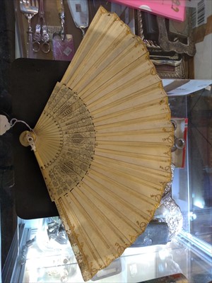 Lot 96 - A late 18th century, ivory, pique and mother of pearl inlaid fan