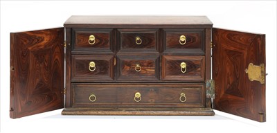 Lot 663 - A laburnum table cabinet