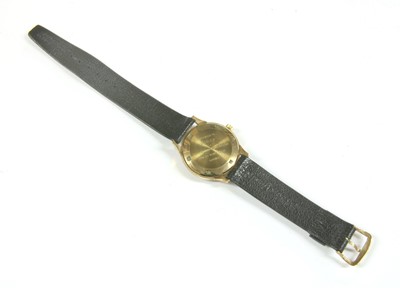 Lot 194 - A gentlemen's 9ct gold Garrard automatic strap watch, c.1970