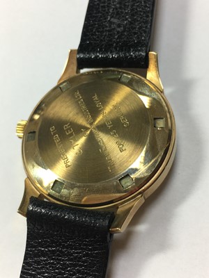 Lot 194 - A gentlemen's 9ct gold Garrard automatic strap watch, c.1970