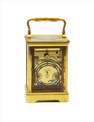 Lot 194 - A French brass cased carriage clock