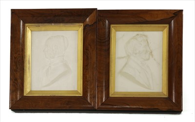 Lot 405 - A pair of 19th century plaster relief silhouettes