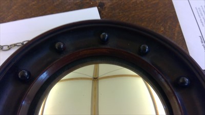 Lot 96 - A pair of small mahogany-framed convex wall mirrors