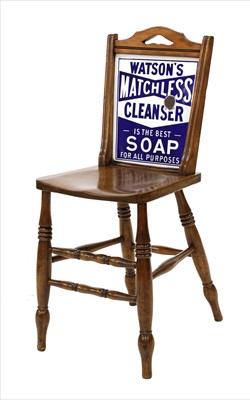 Lot 640 - A walnut advertising chair