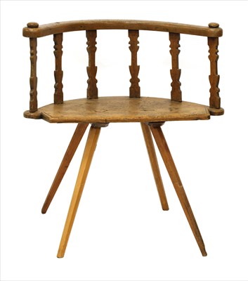 Lot 672 - A primitive South German apple wood chair