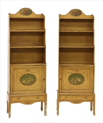Lot 927 - A pair of painted waterfall bookcases