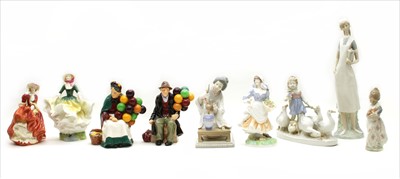 Lot 229 - Four Lladro and four Royal Doulton figures