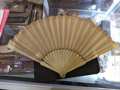 Lot 98 - A late 19th century ivory fan