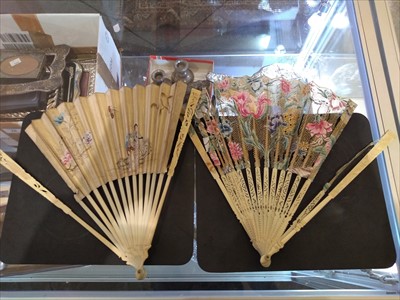 Lot 100 - An 18th century ivory and pique inlaid fan