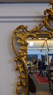 Lot 642 - A carved giltwood framed pier mirror
