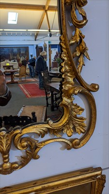 Lot 642 - A carved giltwood framed pier mirror