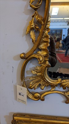 Lot 642 - A carved giltwood framed pier mirror