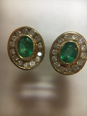 Lot 37 - A pair of 9ct gold emerald and diamond cluster earrings