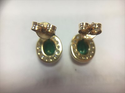 Lot 37 - A pair of 9ct gold emerald and diamond cluster earrings