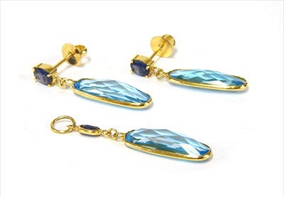 Lot 140 - A gold blue topaz and sapphire earrings and pendant suite