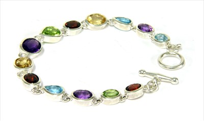 Lot 105 - A sterling silver assorted gemstone bracelet