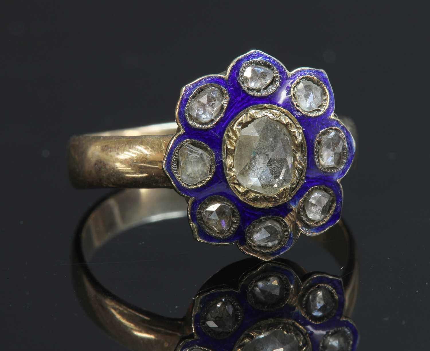 Lot 18 - A rose cut diamond and enamel cluster
