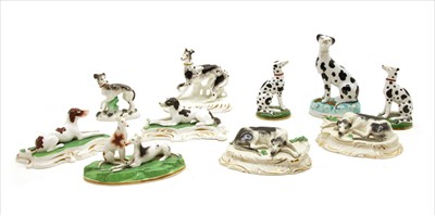 Lot 250 - A pair of English porcelain Greyhound figures