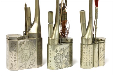 Lot 59 - A collection of three Chinese water pipes