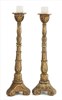 Lot 803 - A large pair of carved giltwood torchères