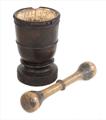 Lot 373 - A large wooden pestle and mortar