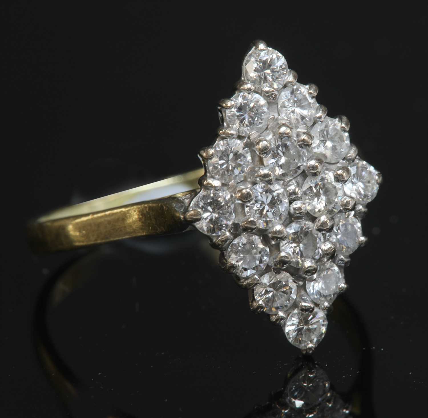 Lot 294 - An 18ct gold lozenge-shaped diamond set cluster ring