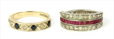 Lot 11 - A 9ct gold sapphire and diamond half eternity ring