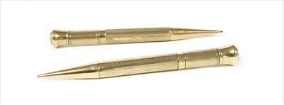 Lot 69 - A pair of 9ct gold propelling pencils