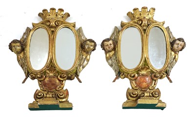 Lot 648 - A pair of giltwood reliquary stand mirrors