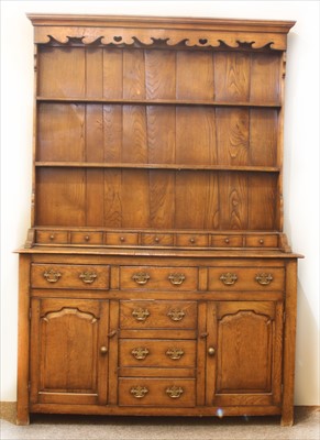 Lot 543 - A Georgian style oak dresser