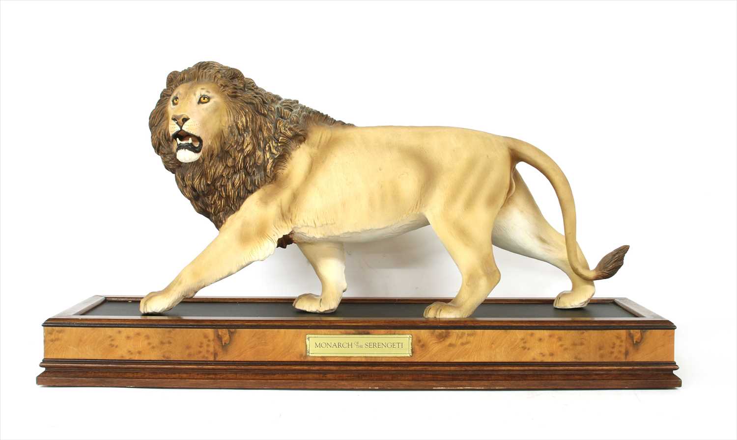Lot 318 - A collection of four Franklin Mint ceramic model wild cats