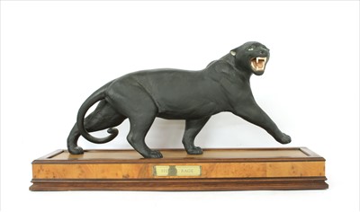 Lot 318 - A collection of four Franklin Mint ceramic model wild cats