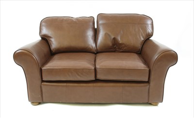 Lot 625 - A modern brown leather two seater settee