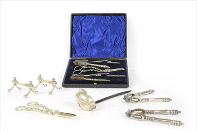 Lot 94 - A cased pair of mother-of-pearl watercress and grape scissors