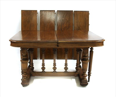 Lot 603 - A 19th century Continental walnut dining table