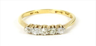 Lot 10 - A gold five stone diamond ring