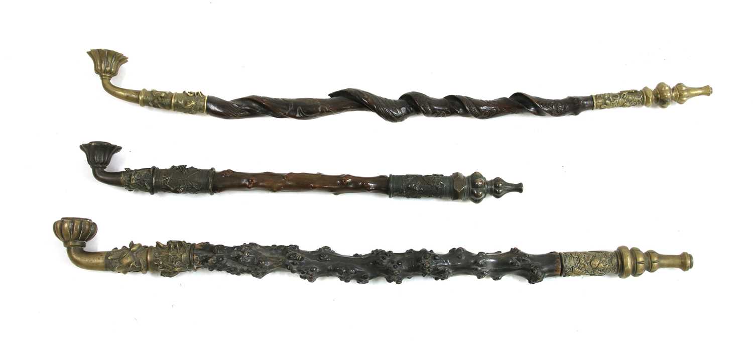 Lot 64 - Three Chinese rootwood opium pipes