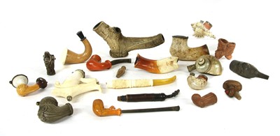 Lot 223 - A carved stag antler pipe bowl